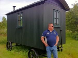 Mark outside a Plankbridge shepherd's hut