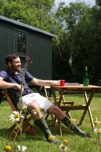 Kristian relaxing outside the hut