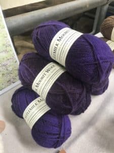 balls of purple wool