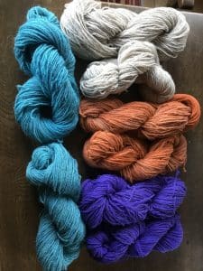 Skeins of different coloured yarn